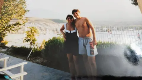 Kam Miller Kam Miller, pictured here with her husband, Neil, when they were younger. 