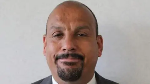 Dartford Labour An image of a bald man smiling at the camera