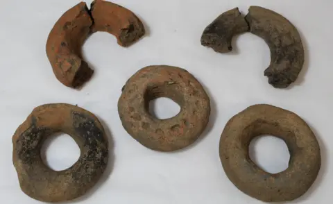 Archaeological Research Services Five ring-like items