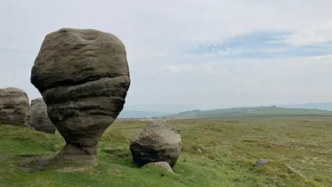 Charles Heslett/BBC The pedestal rock on Bridestones Moor above Todmorden