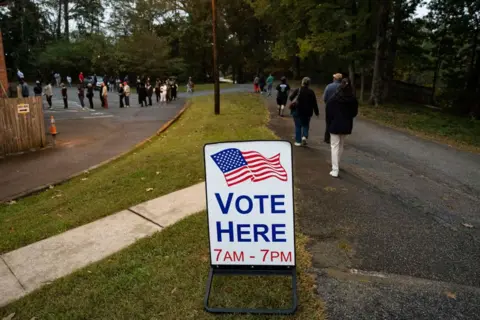 Christian Monterrosa/Bloomberg via Getty Images Voters wait in line to cast their ballot at a polling location for the 2024 Presidential election at King Springs Baptist Church in Smyrna, Georgia, US, on Tuesday 5 November 2024