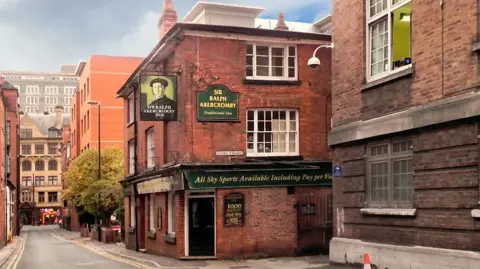 Geograph/David Dixon A red brick public house on Bootle Street, Manchester. The sign reads Sir Ralph Abercromby Inn. There is a sign which reads Sykes Court.