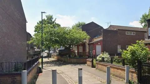 A walkway between houses