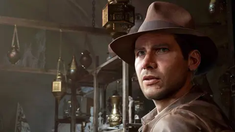 MachineGames A screenshot from a video game of a character that looks like Harrison Ford wearing a brown hat and jacket