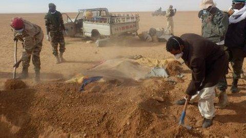 A grave being dug for one of the dead migrants in Niger