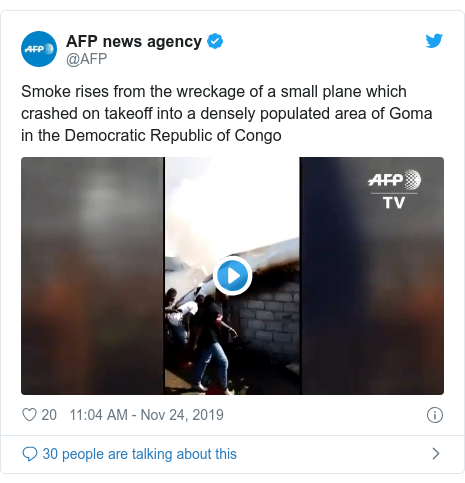 Twitter post by @AFP: Smoke rises from the wreckage of a small plane which crashed on takeoff into a densely populated area of Goma in the Democratic Republic of Congo 