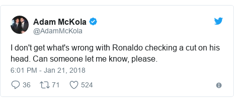 Twitter post by @AdamMcKola: I don't get what's wrong with Ronaldo checking a cut on his head. Can someone let me know, please.