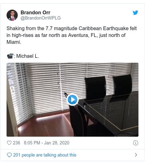 Twitter post by @BrandonOrrWPLG: Shaking from the 7.7 magnitude Caribbean Earthquake felt in high-rises as far north as Aventura, FL, just north of Miami. 📹  Michael L. 