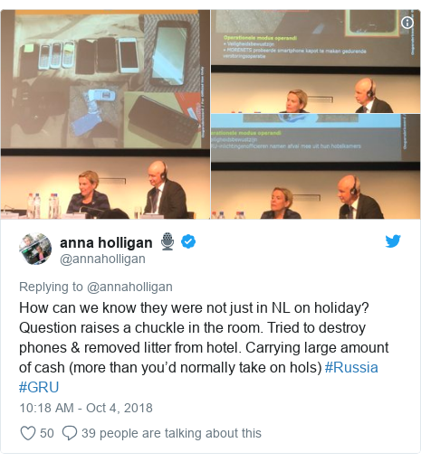 Twitter post by @annaholligan: How can we know they were not just in NL on holiday? Question raises a chuckle in the room. Tried to destroy phones & removed litter from hotel. Carrying large amount of cash (more than you’d normally take on hols) #Russia #GRU 