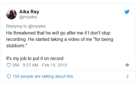 Twitter post by @reyaika: He threatened that he will go after me if I don't stop recording. He started taking a video of me "for being stubborn."It's my job to put it on record