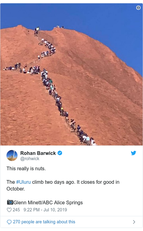 Twitter post by @rohwick: This really is nuts.The #Uluru climb two days ago. It closes for good in October.📷Glenn Minett/ABC Alice Springs 