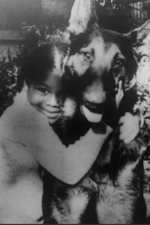 Janet Jackson, at home with the Jackson family dog in Encino, California, circa 1977