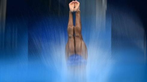 Egypt's Mohab Ishak competes in the preliminary round of the men's 3m springboard diving event during the Tokyo 2020 Olympic Games at the Tokyo Aquatics Centre in Tokyo on August 2, 2021.
