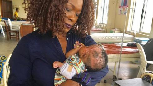 Iby Ikotidem with child