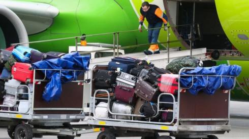 Checked baggage loaded into an airplane of the Rossiya Airlines at St Petersburg's Pulkovo International Airport