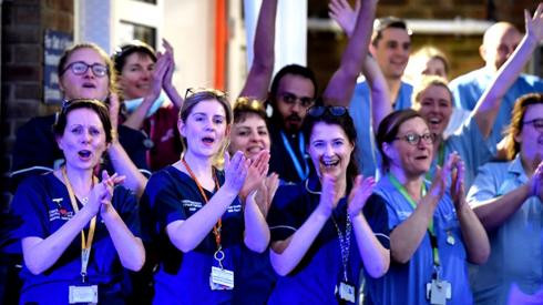 NHS staff applaud outside the Dorset County Hospital in Dorchester