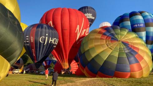 Hot air balloons preparing to take to the sky