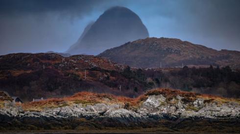 A cloud-covered mountain