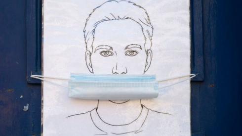 An illustration with a face mask