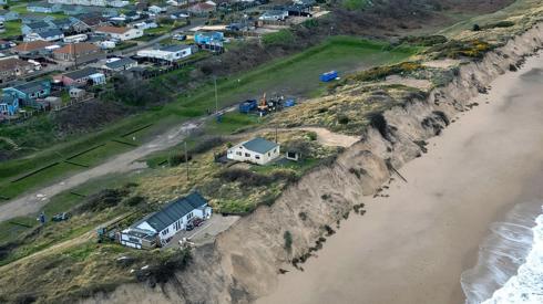 Aerial view of Hemsby coastline that has been hit by erosion