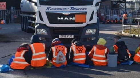 Protesters blocking lorry