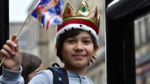 A well-wisher outside St Giles' Cathedral, Edinburgh, ahead of the National Service of Thanksgiving and Dedication for King Charles III and Queen Camilla, and the presentation of the Honours of Scotland