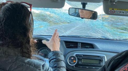 A doctors car's smashed window screen