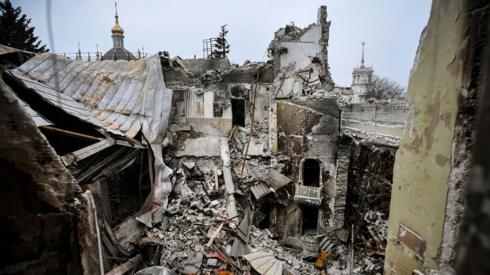 This picture shows the partially destroyed Mariupol drama theatre, bombed last March 16, in Mariupol on April 12, 2022