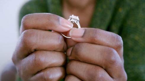 Person holding a ring