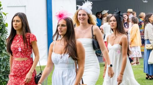 A group of women arriving at the regatta