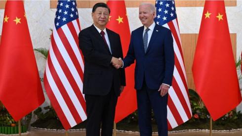 Xi and Biden shake hands