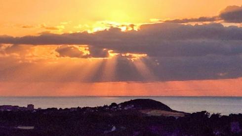 Sunset over a coastline