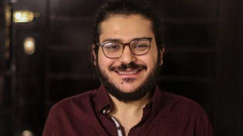 File photo showing Patrick Zaki in Cairo after a court ordered his provisional release (7 December 2021)