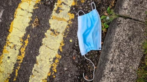 Discarded face mask