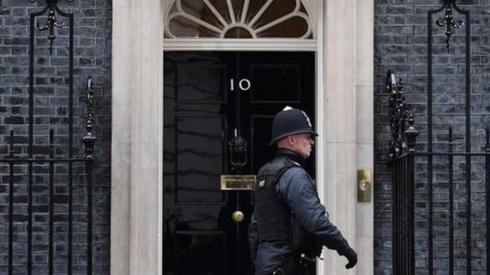 Police walking outside Downing Street