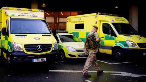 Military personnel preparing to cover ambulance workers on strike in London