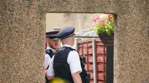 Police aoutside flat in Staines Road, Bedfont