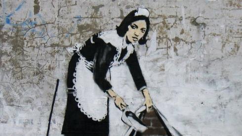 Sweeping it Under the Carpet, Banksy