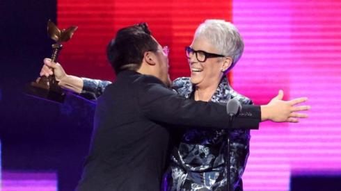 Director Daniel Kwan embraces Jamie Lee Curtis