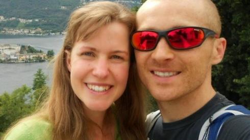 Dan and Esther take a selfie next to a lake