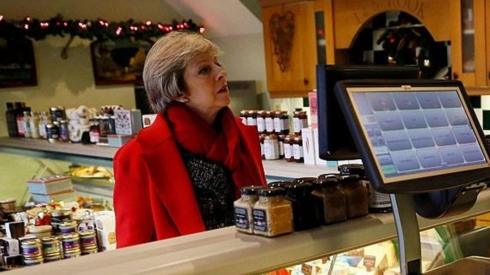 Theresa May and local butcher