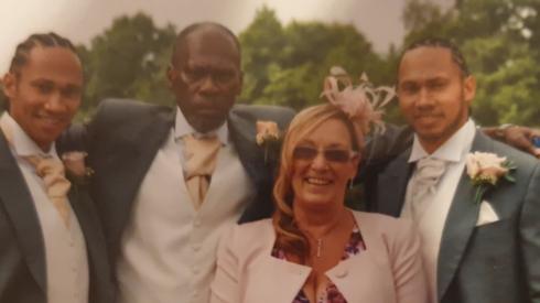 Earl Sewell with his wife and sons