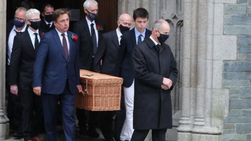 John Hume's coffin leaving St Eugene's Cathedral