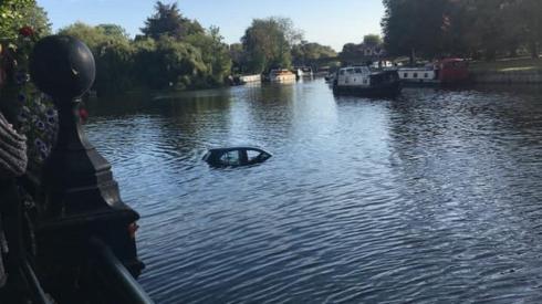 Car in the river Thames