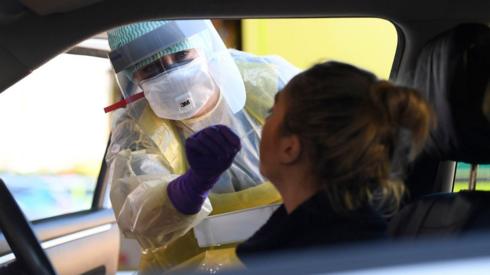 An emergency department nurse during a demonstration of the coronavirus pod and covid-19 virus testing procedures set-up at Antrim Area Hospital in Northern Ireland.