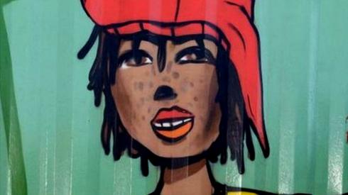 King Philippe - Filip of Belgium finishes a painting during a visit to the Philippi Village with several activities, Close the gap, Assitej, Soccer pitch, Mural, part of a state visit of the Belgian Royal Couple to the Republic of South Africa, in Cape Town, Sunday 26 March 2023.