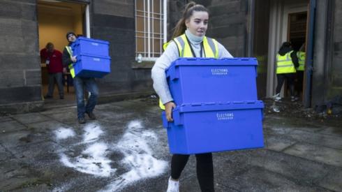 ballot boxes being delivered