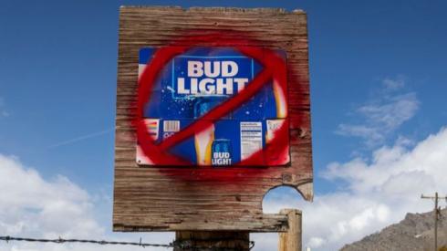 A sign disparaging Bud Light beer is seen along a country road on April 21, 2023 in Arco, Idaho. Anheuser-Busch, the brewer of Bud Light has faced backlash after the company sponsored two Instagram posts from a transgender woman.