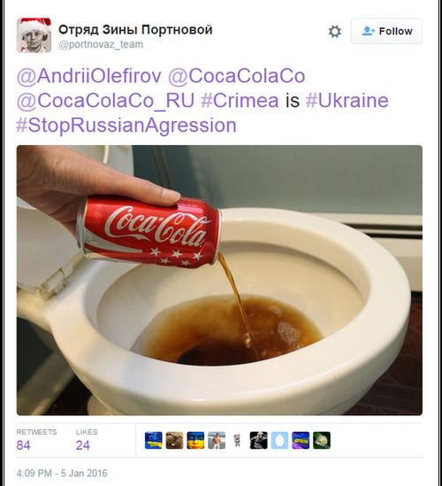 A tweet shows someone pouring Coca Cola in a toilet, with the caption reading "#Crimea is #Ukraine #StopRussianAggression"
