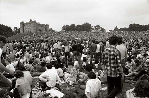 Fans sit at Slane Castle during the first show in 1981